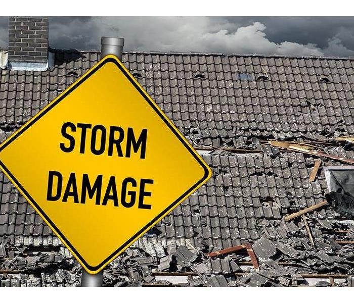 storm damage sign for roof repair